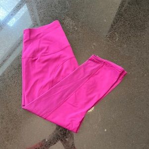 Fuchsia cropped Lululemon size 8 leggings.
